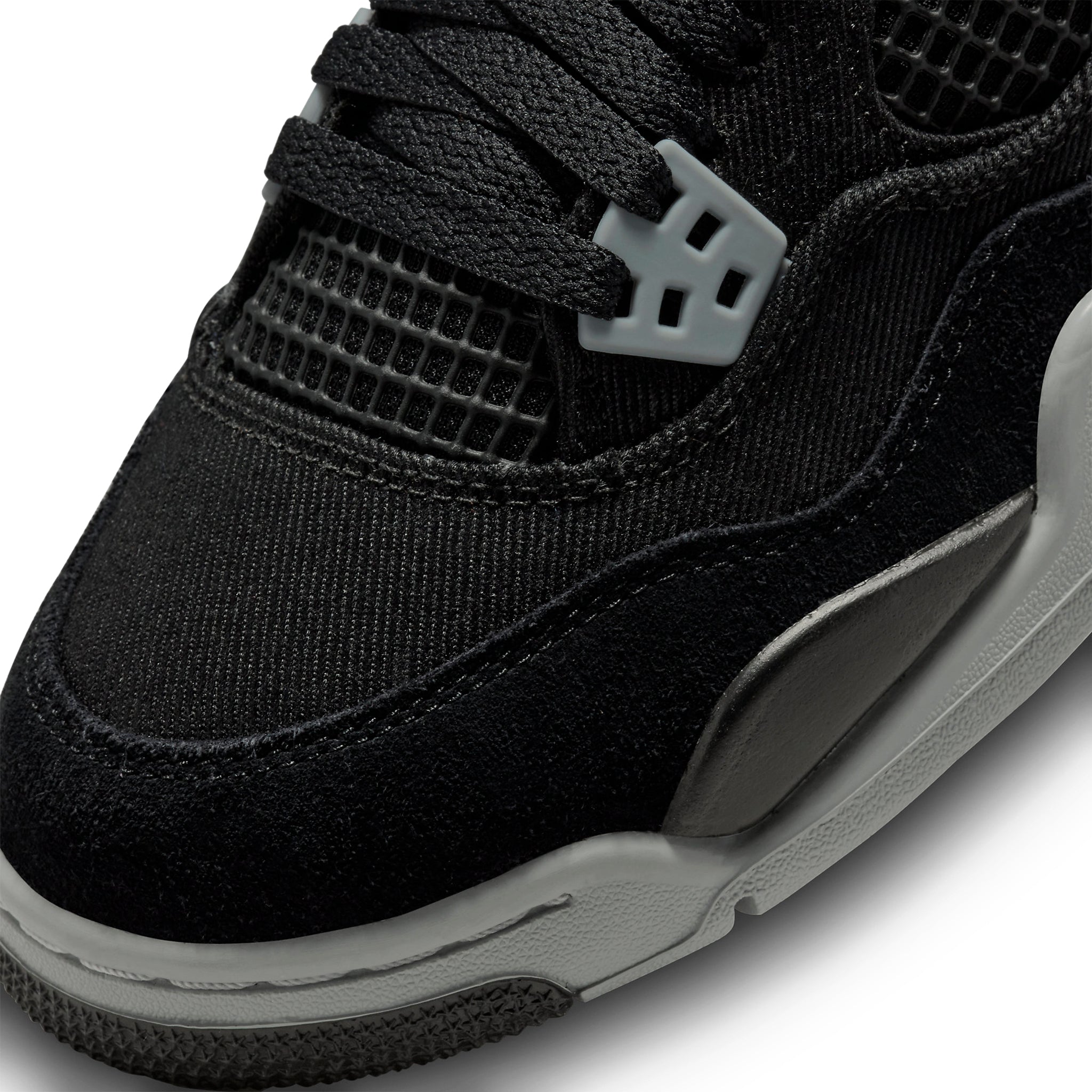 Toe box view of Air Jordan 4 Retro Black Canvas (GS) DV0553-006